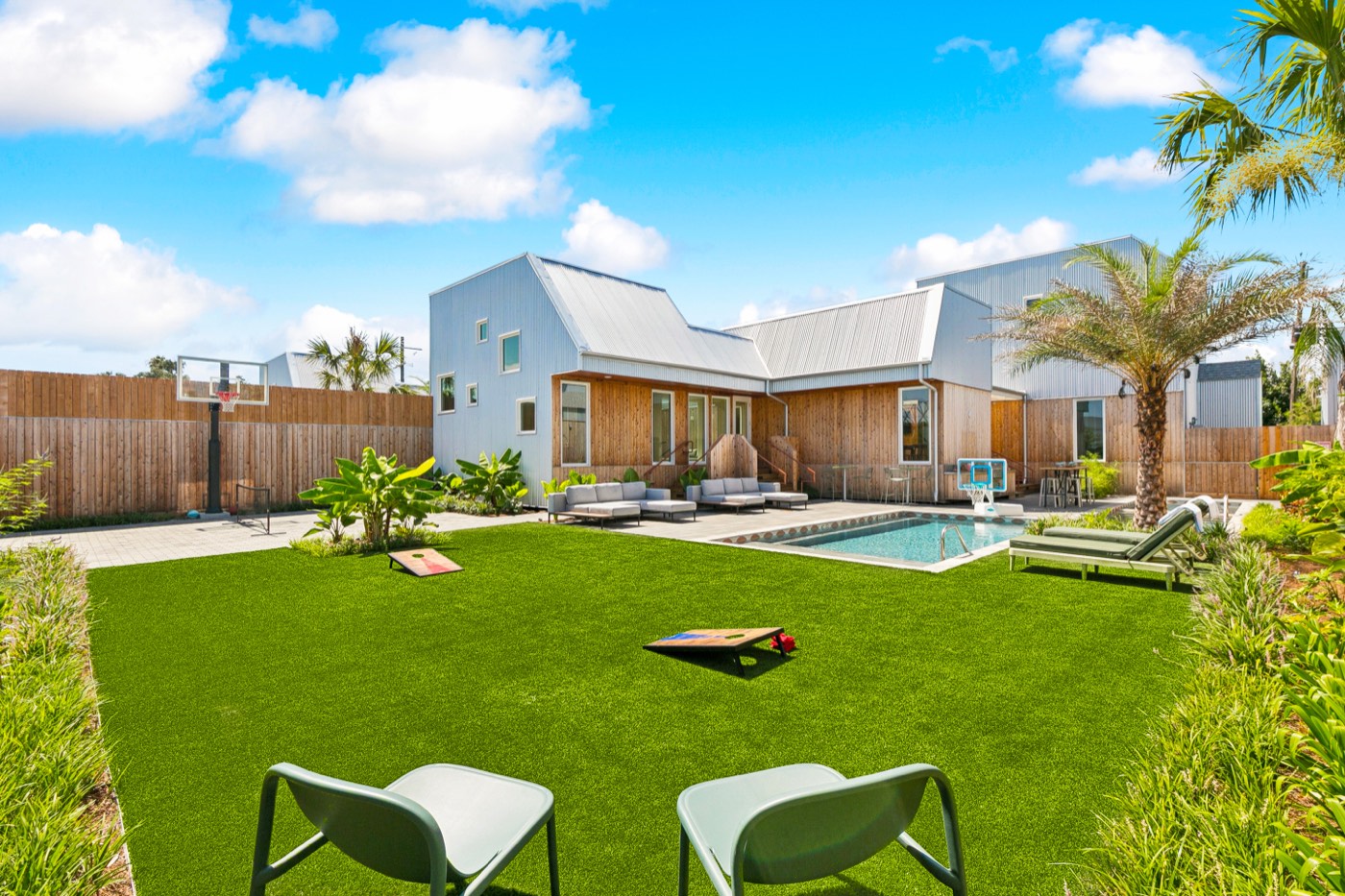 Modern villa with private pool, lawn, and basketball court in New Orleans